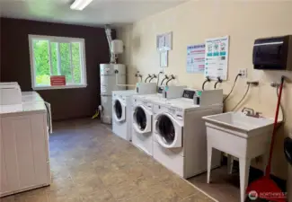 Laundry room just across the parking lot.