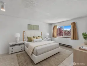 The primary bedroom offers direct access to the full bath, creating a semi-ensuite feel for added privacy and comfort.