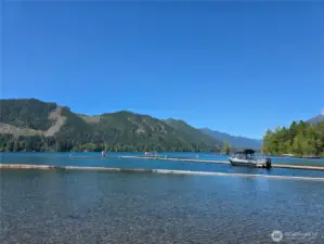 community beach area with dock/moorage