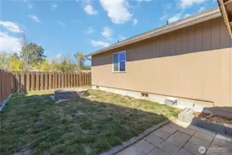 Backyard Side Yard with Fire Pit and Tool Shed