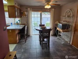 Dining room opens into backyard deck seating