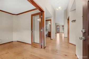 The entry hall opens into the spacious great room and kitchen.