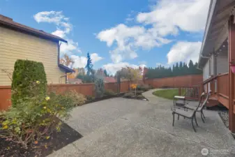 A patio perfect for relaxing and hosting barbecues just off the deck.