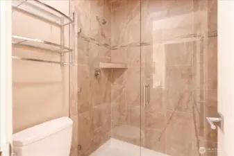 Shower and toilet in separate room for added privacy.