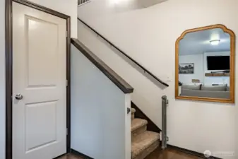 From entryway coat closet and stairs to 2nd leve