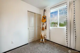 Bedroom 2 closet & natural light