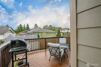 Spacious back deck w/dog access to dog run (not pictured) from deck