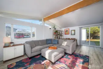 Sun soaked living room with ample windows.