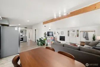Striking exposed beam through the main living space adds character.
