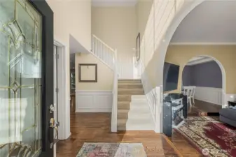Stepping inside to high vaulted ceilings and arched entryways between rooms
