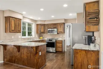 Walk through the entrance around to the rear of the house to find the perfect open concept you were looking for