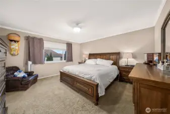 Upstairs your first bedroom is the primary suite!