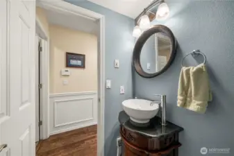 Main floor 1/2 bath off the laundry and garage