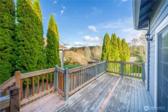 2nd deck off formal dining room, 2 sets of stairs - off to rear and side yards!