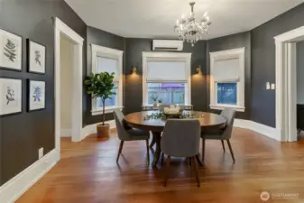 A sizeable dining room accessible from anywhere on the main floor. *virtually staged