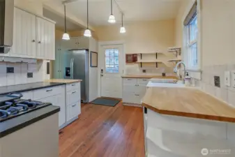 The butcher block kitchen off of the dining room.