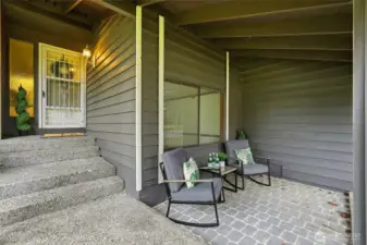 Covered front porch with charming curb appeal.