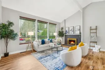 Walls of windows bring in abundant natural light.