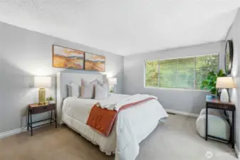 Peaceful upstairs sanctuary with natural light.