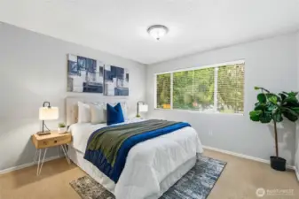 Two bright and versatile secondary bedrooms are located upstairs.