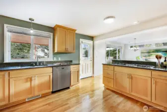 Open the door for parties on the covered deck beyond.