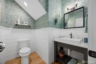 Convenient powder room for guests, ideal when entertaining.