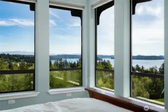 Guest bedroom on main with incredible sweeping views of the bay