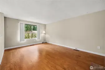 Main level opens to the good-sized living room.