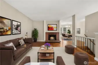 Virtually staged living and dining rooms.