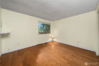 The primary bedroom includes a wall of closets and separate door to the hall bathroom.