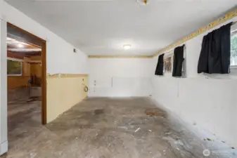 This room is the largest on the lower level and was used as a bedroom. It would make a great media room, as well. It has access to the full bathroom and bonus storage/hobby room.