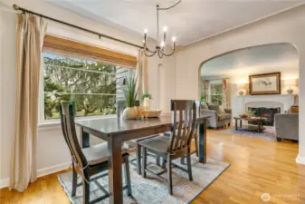 Looking back toward the living room, the arched entry and consistent millwork create a cohesive, timeless feel throughout.