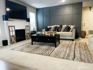 Cozy living room with cozy fireplace.