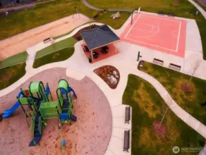 Location, location! Only one block to city park amenities: zip line, playhouse, basketball court, and seating to relax.