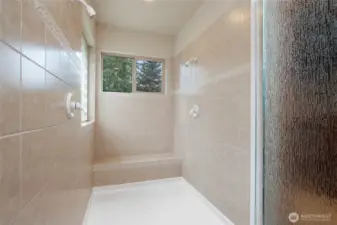 Double headed walk-in shower.