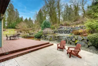 Relax and enjoy the solitude.  Admire the rock terraces, stamped concrete and beautiful landscaping.