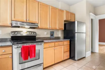 Kitchen.  Tons of storage, Stainless Steel appliances and Granite Countertops