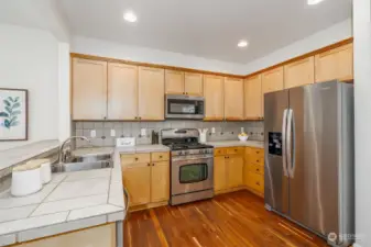 Spacious Kitchen with Stainless appliances and lots of cabinet space