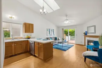 The family room and kitchen are flooded with natural light thanks to the skylights, and the open “great room” concept offers easy flow for entertaining.