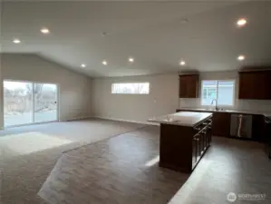 Kitchen and patio off living room