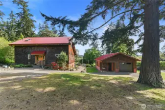 713 and 715 M street, two addresses, two lots, one beautiful and serene setting. The future owner might segregate the two lots and build a new home or ADU on the resepective new tax parcel-buyer to verify with city. would require boundary line survey and adjustment for setbacks and city approval. so many So many options with the beautiful home!
