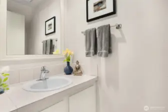 Updated vanity with under-sink storage offers style and functionality, perfect for organizing your essentials.