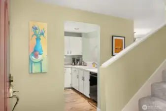 Wall space is ideal for hanging family photos, artwork, or a stylish mirror to open up the space.