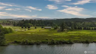 Home sweet home with 835+ feet o river frontage.