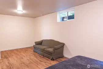 One of 2 large bonus rooms downstairs. This would be a perfect work-out room or play room. The other bonus room (currently being used for storage) would be a nice office or theater room.