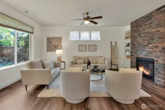 Get comfortable and cozy as you gather around the fireplace bringing warmth and ambiance to the room.