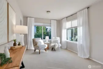 A sweet sitting area to sit and relax, enjoy.