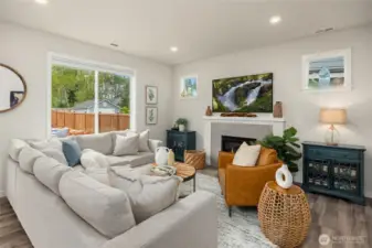 Plenty of room to sit around the gas fireplace and chat or watch tv.