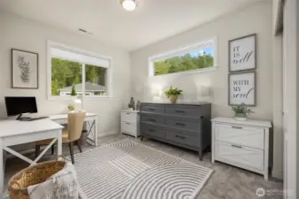 This is the main floor bedroom currently being used as a combo office and guest space. (that dresser opens up to a fold out bed). Owner is open to selling furnishings.