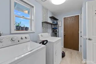 Laundry room off the kitchen and garage